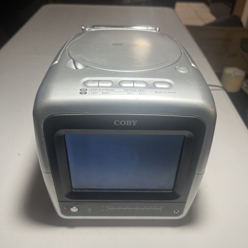 Coby TF-DVD1256 Portable 5.6in Color TV DVD CD Player AM FM Radio Silver